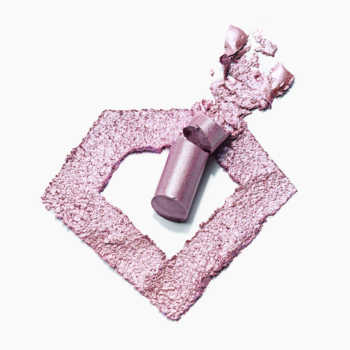 Otwarty cień Catrice Drunk'n Diamonds Stick Lavender Jelly Haze, z błyszczącym lawendowym pudrem diamentowym.