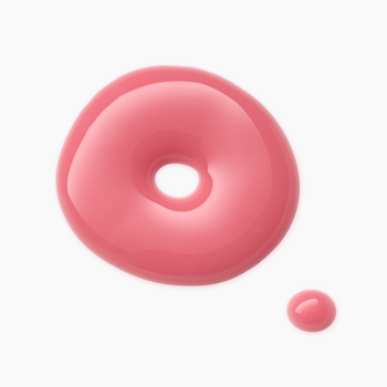 Różowy błyszczyk Catrice Gloss Obsessed, dwie lśniące krople na białym tle; większa w kształcie pierścienia, mniejsza obok.