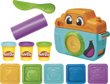 Zestaw Play-Doh Starters Fotozabawa: pomarańczowa kamera, zielone narzędzie, 4 ciastoliny i 5 stempli.