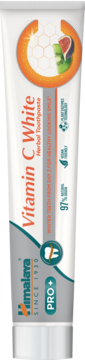 Himalaya Vitamin C White Herbal Toothpaste w białej tubce, z przodu logo i grafika kiwi i figi.