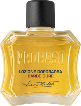 Proraso Lożion po goleniu Barbe Dure, bursztynowy płyn w szklanej butelce z czarną nakrętką, widok z przodu.