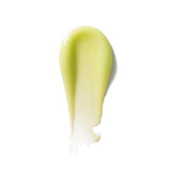 Smuga jasnozielonego, peptydowego balsamu do ust Matcha Latte o kremowej konsystencji na białym tle.