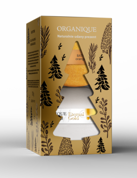 Złoty zestaw ORGANIQUE Eternal Gold w pudełku z ozdobnym wycięciem w kształcie choinki, ukazującym peeling i mydło.