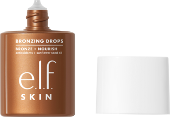e.l.f. Skin Bronzing Drops Pure Gold w miedzianej butelce z kroplomierzem, biała nakrętka obok, widok z przodu.