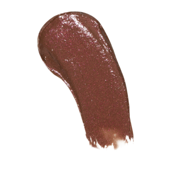 Swatch błyszczyka Revolution Pout Lip Gloss Stick Shimmer Toasted Caramel, gęsta, mieniąca się, karmelowa smuga.