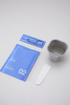 Zestaw Mediheal Derma Modeling Pack Hyaluronate: ampułka, maska w saszetce, miseczka i szpatułka na białym tle.