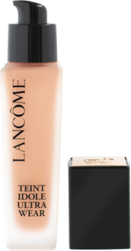 Kryjący podkład Lancôme Teint Idole Ultra Wear w matowej butelce z pompką, obok czarna nakładka.