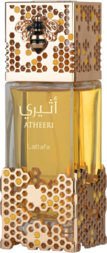 Flakon orientalnych perfum Atheeri Lattafa. Bursztynowy płyn, złoty wzór plastra miodu i pszczoła.