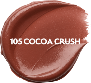 Zbliżenie na brązowy, kremowy swatch kosmetyku do makijażu, odcień 105 Cocoa Crush, z widocznym połyskiem.