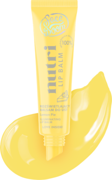 Żółty rozświetlający balsam do ust FaceBoom nutri Lip Balm Lemon Pie, tubka obok rozlanej kropli produktu.