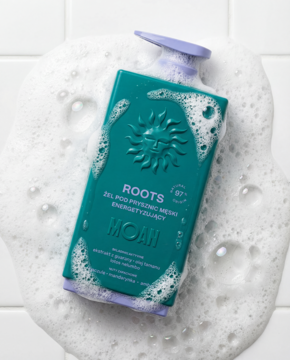 Ciemnoturkusowy, energetyzujący żel pod prysznic ROOTS dla mężczyzn z lawendową pompką, w pianie na kafelkach.