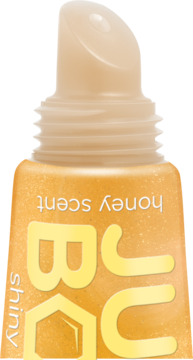 Zbliżenie na aplikator błyszczyka essence JUICY BOMB 109 Bee Mine w miodowym odcieniu z brokatem.