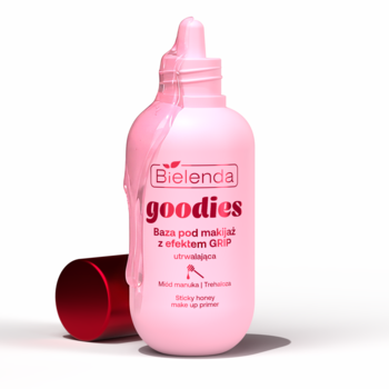 Różowa baza Bielenda Goodies pod makijaż z efektem GRIP, z rozlanym płynem i zdjętą czerwoną nakrętką, widok z przodu.