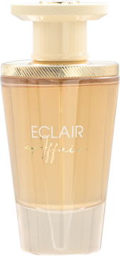 Złoty flakon perfum Eclair Affair z rzeźbionym szkłem i złotymi detalami, widok z przodu.