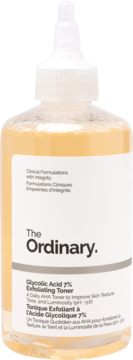 The Ordinary Glycolic Acid 7% Exfoliating Toner, butelka z pomarańczowym płynem i białą zakrętką, widok z przodu.
