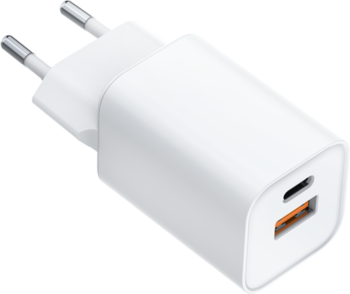 Biała ładowarka sieciowa z portami USB-C i USB-A (pomarańczowy wewnątrz), widok pod kątem.