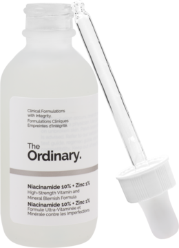 Serum The Ordinary Niacinamide 10% + Zinc 1% w matowej białej butelce, z widoczną etykietą i pipetą obok.