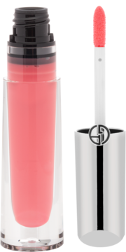 Koralowy błyszczyk do ust Giorgio Armani Prisma Glass w szklanej butelce, obok widoczny aplikator z logo GA.