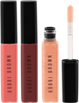 Bobbi Brown Mini Crushed Lip Gloss Trio: trzy nawilżające błyszczyki w odcieniach nude i czerwieni, jeden otwarty z aplikatorem.