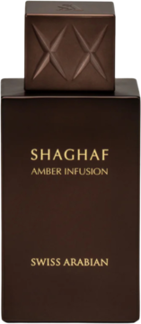 Ciemnobrązowa butelka Shaghaf Amber Infusion Swiss Arabian, ze zdobioną, fasetowaną nakrętką i złotymi napisami.