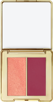 Otwarta, złota paletka do makijażu z lusterkiem, zawierająca brzoskwiniowy rozświetlacz i matowy śliwkowy róż.