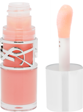 Błyszczyk YSL w brzoskwiniowym odcieniu, przezroczysta butelka z logo i oddzielny aplikator.