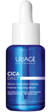 Uriage Cica Daily Intense Repairing Serum w niebieskiej butelce z białą pipetą, widok z przodu. Napis: CICA DAILY.