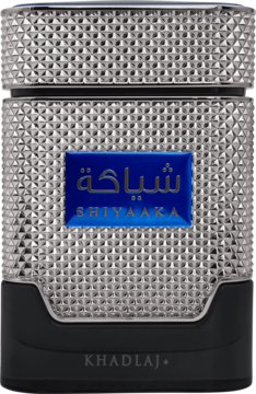 Srebrny flakon perfum Shiyaaka z fasetowaną, diamentową teksturą i niebieską etykietą, czarna podstawa, widok z przodu.