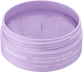 Lawendowe, otwarte opakowanie Biodance Caviar PDRN Eye Patches z widocznymi hydrożelowymi płatkami.