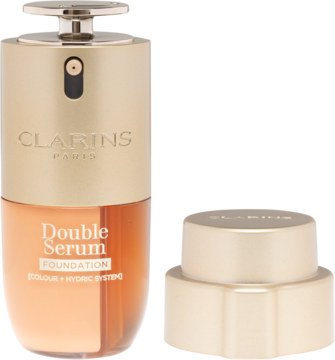 Podkład-serum Clarins Double Serum Foundation w złoto-bursztynowej butelce z pompką, widok frontalny, obok złota nakrętka.