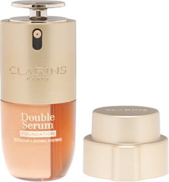 Clarins Double Serum Foundation fluid do twarzy, złoto-bursztynowa butelka z pompką i nakrętką.