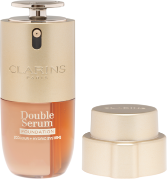 Fluid do twarzy Clarins Double Serum Foundation, złota butelka z pompką, widok z przodu, obok zakrętka.