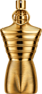 Złota butelka perfum Jean Paul Gaultier Le Male Elixir Absolu w kształcie męskiego torsu, z prążkowaną fakturą.