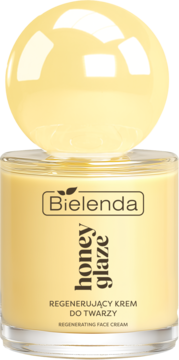 Bielenda Honey Glaze Regenerating Face Cream w złocistym słoiczku z błyszczącą kulistą nakrętką.