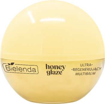 Bielenda honey glaze ultra-regenerujący multibalm w żółtym, kulistym słoiczku z miodem manuka, widok z przodu.
