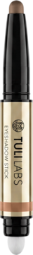 TULI LABS Eyeshadow Stick w odcieniu brązu z czarno-złotym opakowaniem i gąbką do blendowania.