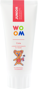 Biała tuba pasty WOOM JUNIOR COLA 6+ lat, z misiem, napisem 98% naturalnych składników, widok z przodu.
