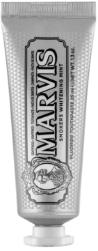 Srebrna tuba Marvis Smokers Whitening Mint Fluoride Toothpaste, 25ml, widok z przodu, wzorzyste tło.