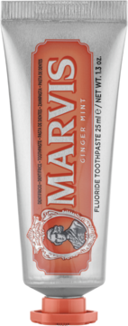 Marvis Ginger Mint Mini pasta do zębów z fluorem w srebrnej tubce z pomarańczową etykietą, widok z przodu.