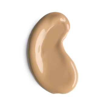 Duża kropla podkładu Artdeco Light Luminous Foundation w odcieniu Warm Golden Tan, gładka i rozświetlająca, na białym tle.