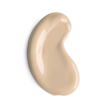 Zbliżenie na kroplę jasnobeżowego podkładu Artdeco Light Luminous Foundation Neutral Porcelain, o kremowej teksturze.