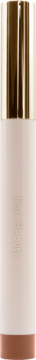Rare B. All Weightless Eyeshadow Stick Adventure, z złotą nakrętką, bladoróżowym korpusem i miedzianą podstawą.