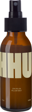 Mgiełka Zen Relax Pillow Mist z zieloną herbatą i eukaliptusem, bursztynowa butelka z atomizerem.