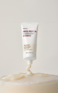 Nacific Rice-Pepta Collagen Sherbet Cleansing Balm w białej tubce, wyciskany balsam tworzy spiralę na jasnym tle.