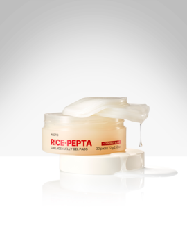 Nacific Rice-Pepta Collagen Jelly Gel Pads, otwarty słoiczek z beżową podstawą i białym żelem wypływającym na białe tło.