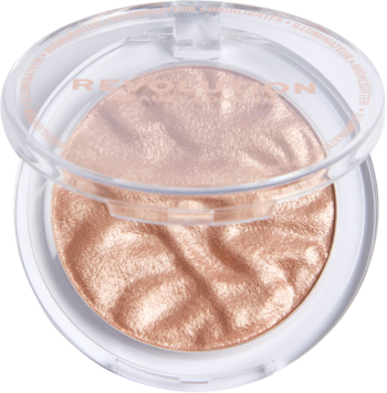 Zbliżenie na otwarty rozświetlacz Revolution Reloaded Highlighter Set The Scene, szampański, świetlisty, z delikatną fakturą.