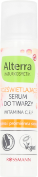 Alterra rozświetlające serum do twarzy z witaminami C,E,F w białej butelce. Zielona etykieta, widok z przodu.