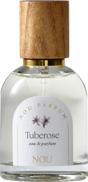 Nou Tuberose woda perfumowana, przezroczysta butelka z drewnianą nakrętką i białą etykietą z różowymi kwiatami. Ujęcie z przodu.