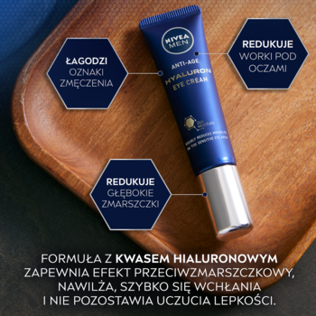 NIVEA MEN Anti-Age Hyaluron krem pod oczy w granatowej tubce na drewnianej tacy, redukuje zmarszczki i obrzęki.