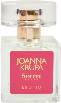 Perfumy Joanna Krupa Secret Sense ESOTIQ w przezroczystej butelce z różową etykietą i złotym atomizerem, widok z przodu.